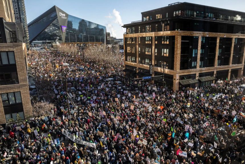 Thousands march through downtown Minneapolis protesting against ICE as state workers hold general strike